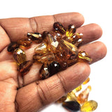 200 Pcs Pkg. Brown color, Drop Faceted Crystal Glass beads, size encluded as 5X7MM, 8X12MM, 10X15MM AND SOME 3X5MM