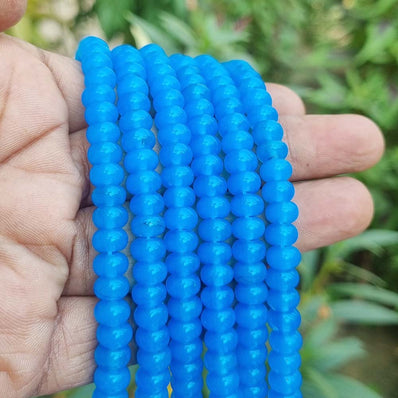 RONDEL SHAPE' 6X8 MM' PLAIN SMOOTH SURFACE 16 INCHES LONG' 84-86 PIECES' ORIGINAL COLOR' NOT DYED GLASS BEADS SOLD BY PER LINE PACK