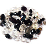 50 Grams Pkg. Faceted Oval Black and White Mix, size encluded as 4x6mm to 8x10mm