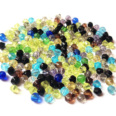 50 Grams Pkg. bi cone new cut Various colors,  in size about 4mm