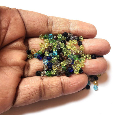 50 Grams Pkg. bi cone new cut Various colors,  in size about 4mm