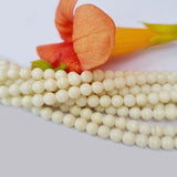 4mm White Coral smooth round, Per line, about 95 beads