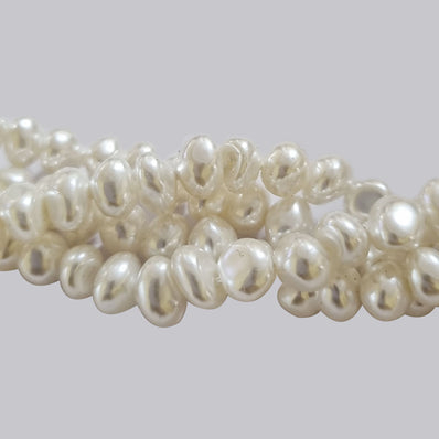 6~7mm Potato Shape fine quality of Shell Pearl Sold Per Line about 78~80 Beads.