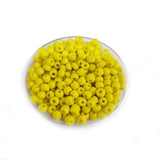 50 grams Pkg. Yellow glass beads in size about 6/0 Size