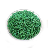 50 grams Pkg. Green Opaque glass beads in size about 11/0 Size