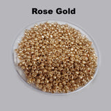 50 Grams Pkg. Metallic Rose Gold Glass seed beads in size about 11/0