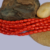 Real Coral Moonga beads in size about 4x6mm tube shape, approx 60 beads