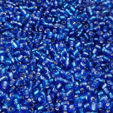 100 grams pkg. 6/0 size (4mm size) glass seed (sugar Beads) Silver line Blue Color