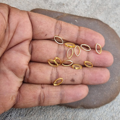 50 PIECES PACK GOLD POLISHED' 5x9 MM APPROX  small SIZE, oval shape