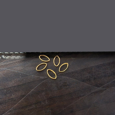 50 PIECES PACK GOLD POLISHED' 5x9 MM APPROX  small SIZE, oval shape