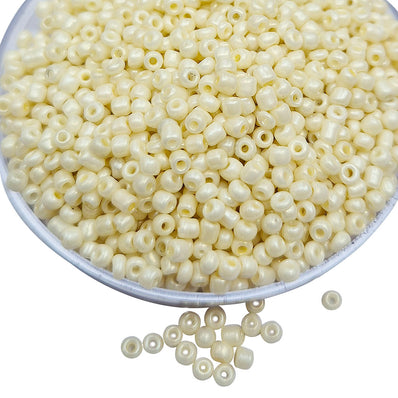 100 GRAMS PACK' Factory over stock, glass seed beads in size about 2.5mm (10/0) Cream Color