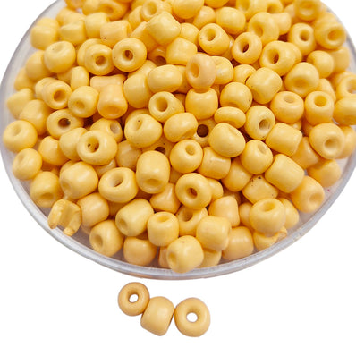 50grams pkg. 6/0 size (4mm approx) glass seed beads, color Dark IVROY