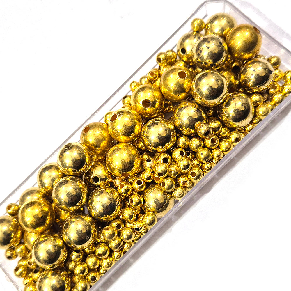 50grms pkg. CCB Golden smooth ball beads, mix size 5mm to 12mm light weight beads