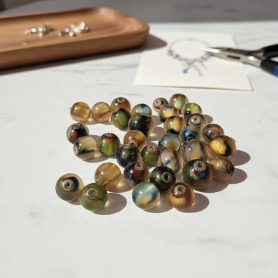 50pcs pkg. Acrylic fancy beads in size about 8~10mm randam mix,matty finish