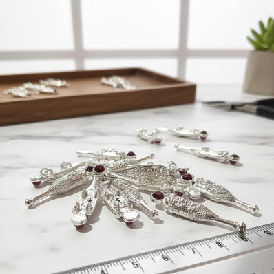 10pcs shiny silver charms, back side 4 loops