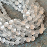 1 STRING/LINE PACK MYSTIC AURA QUARTZ 8 MM ROUND 46-47 BEADS APPROX