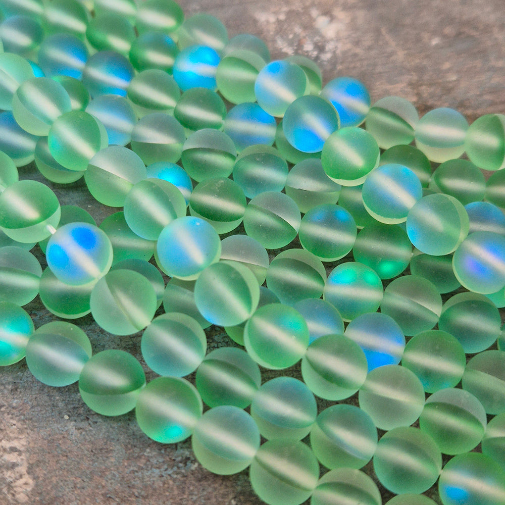 1 STRING/LINE PACK MYSTIC AURA QUARTZ 8 MM ROUND 46-47 BEADS APPROX