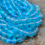 1 STRING/LINE PACK MYSTIC AURA QUARTZ 8 MM ROUND 46-47 BEADS APPROX