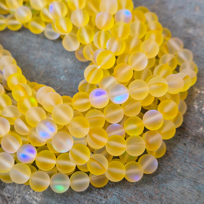 1 STRING/LINE PACK MYSTIC AURA QUARTZ 8 MM ROUND 46-47 BEADS APPROX