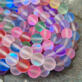 1 STRING/LINE PACK MYSTIC AURA QUARTZ 8 MM ROUND 46-47 BEADS APPROX