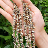 1 STRING/LINE PACK OF UNCUT DALMATIAN UNCUT CHIPS BEADS