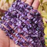 UNCUT SEMI PRECIOUS BEADS' AMETHYST' 30 INCHES APPROX' SOLD BY PER LINE PACK