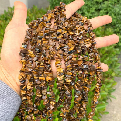 UNCUT SEMI PRECIOUS BEADS' TIGER EYE STONE ' 30 INCHES APPROX' SOLD BY PER LINE PACK