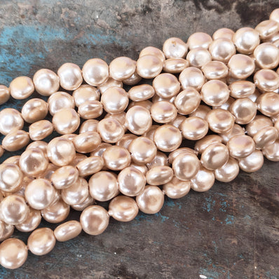 8mm, Coin Shape Shell Pearl Beads with a smooth, glossy finish, perfect for elegant necklaces, bracelets, and premium jewelry designs. Uniform, classy, and ideal for DIY creators. Sold Per Line 47~48 beads