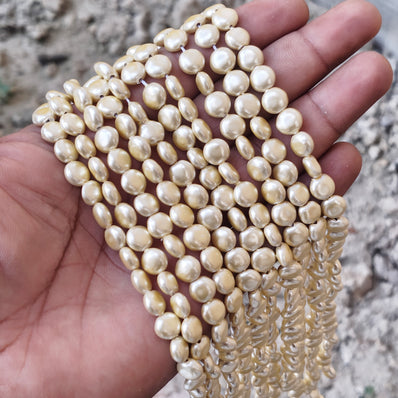 8mm, Coin Shape Shell Pearl Beads with a smooth, glossy finish, perfect for elegant necklaces, bracelets, and premium jewelry designs. Uniform, classy, and ideal for DIY creators. Sold Per Line 47~48 beads