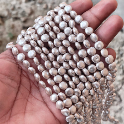 8mm, Coin Shape Shell Pearl Beads with a smooth, glossy finish, perfect for elegant necklaces, bracelets, and premium jewelry designs. Uniform, classy, and ideal for DIY creators. Sold Per Line 47~48 beads