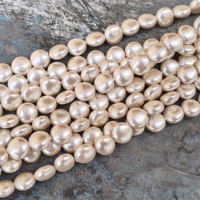 10mm, Coin Shape Shell Pearl Beads with a smooth, glossy finish, perfect for elegant necklaces, bracelets, and premium jewelry designs. Uniform, classy, and ideal for DIY creators. Sold Per Line 37~38 beads