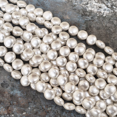 10mm, Coin Shape Shell Pearl Beads with a smooth, glossy finish, perfect for elegant necklaces, bracelets, and premium jewelry designs. Uniform, classy, and ideal for DIY creators. Sold Per Line 37~38 beads