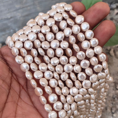 8mm, Coin Shape Shell Pearl Beads with a smooth, glossy finish, perfect for elegant necklaces, bracelets, and premium jewelry designs. Uniform, classy, and ideal for DIY creators. Sold Per Line 47~48 beads