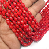 8x5 MM APPROX SIZE' GENUINE CORAL SOLID RED SMOOTH OVAL SHAPE BEADS, APPROX 50-51 BEADS' SOLD BY PER LINE PACK