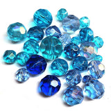 50 Grams Pkg. Round Facet Blue Shade color, size encluded 6~12mm Mixed size