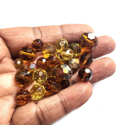 50 Grams Pkg. Round Facet Brown Shade color, size encluded 6~12mm Mixed size