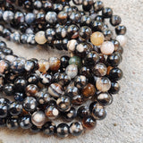 1 STRING/LINE PACK' APPROX 46-47 PIECES' 8MM SIZE FIRE AGATE BEADS