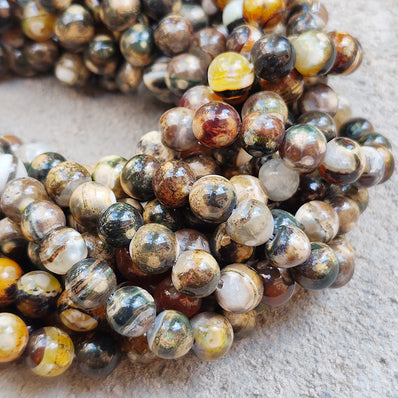 1 STRING/LINE PACK' APPROX 46-47 PIECES' 8MM SIZE FIRE AGATE BEADS