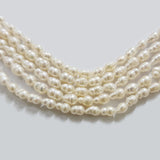 Freshwater Real Pearl Sold Per line in size Approximately 4~6mm and length about  15 1/2 Inches Long