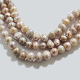 Freshwater Real Pearl Sold Per line in size Approximately 6~7mm and length about  13 1/2 Inches Long