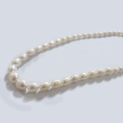 Freshwater Real Pearl Sold Per line in size Approximately 5x6~10x12mm and length about  15 1/2 Inches Long