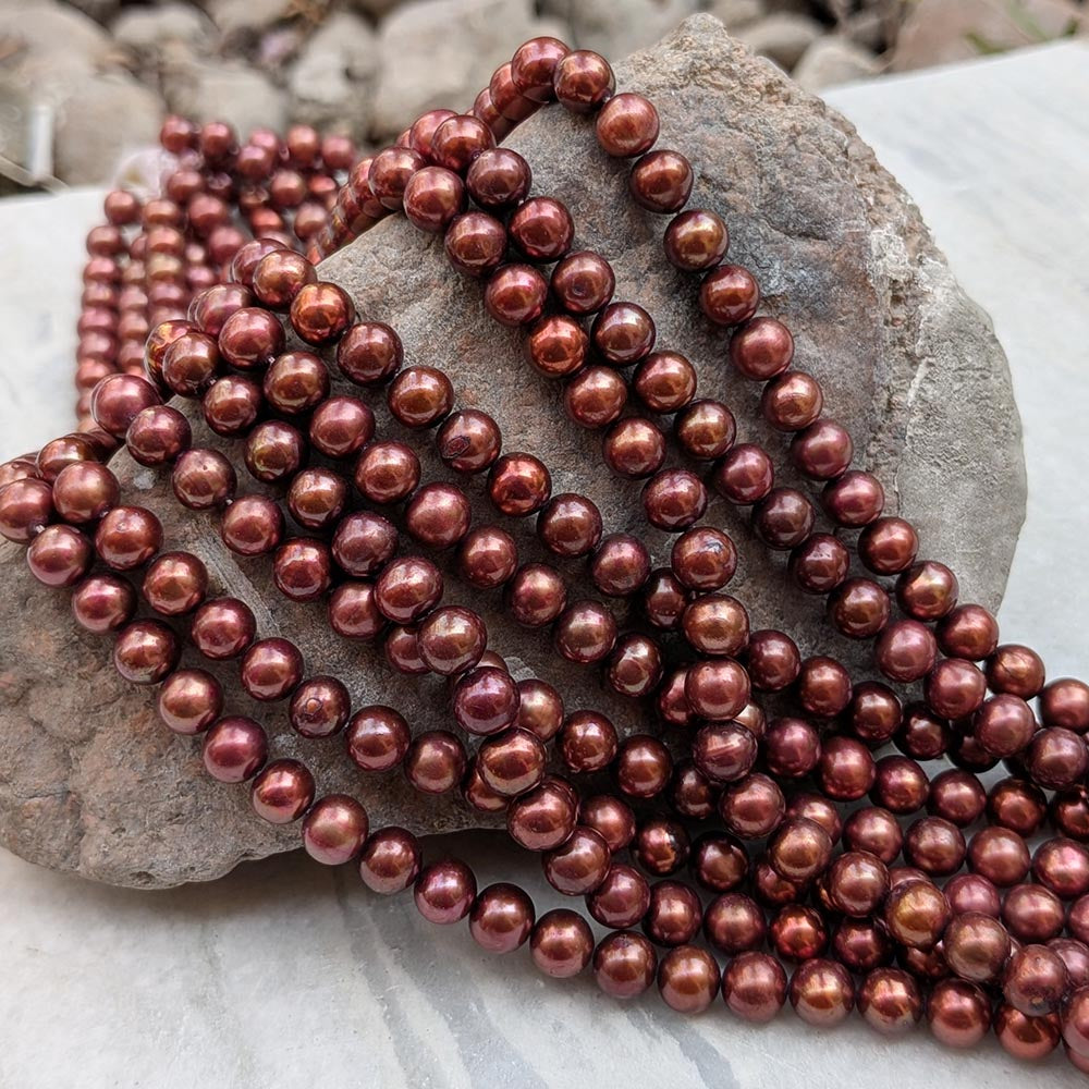 1 STRING PACK' BEAD COUNT' 60-62 PIECES' REAL FRESHWATER PEARL SIZE APPROX' 6-7 MM