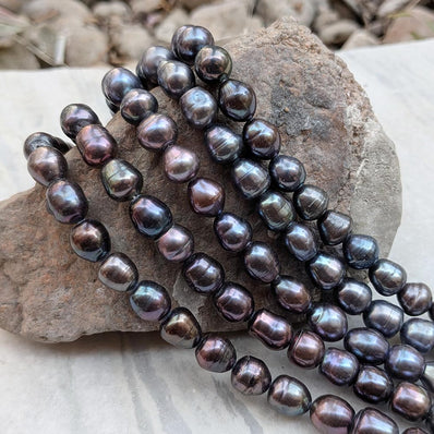 1 STRING PACK' BEAD COUNT' 34-35 PIECES' REAL FRESHWATER PEARL SIZE APPROX' 10-14 MM