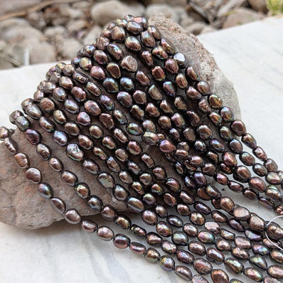 1 STRING PACK' BEAD COUNT' 50-52 PIECES' REAL FRESHWATER PEARL SIZE APPROX' 6-8 MM