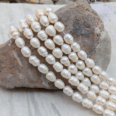 1 STRING PACK' BEAD COUNT' 35-37 PIECES' REAL FRESHWATER PEARL SIZE APPROX' 8-11 MM