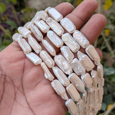 1 STRING PACK' BEAD COUNT' 22-23 PIECES' REAL FRESHWATER PEARL SIZE APPROX' 23-24 MM