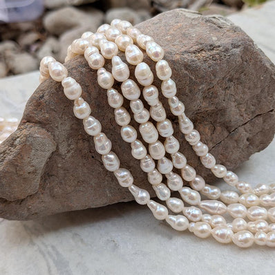 1 STRING PACK' BEAD COUNT' 50-52 PIECES' REAL FRESHWATER PEARL SIZE APPROX' 5-11 MM