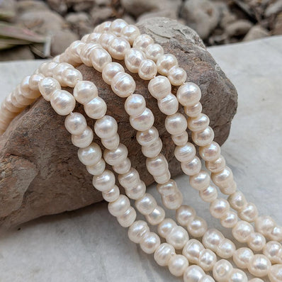 1 STRING PACK' BEAD COUNT' 30-32 PIECES' REAL FRESHWATER PEARL SIZE APPROX' 8-14 MM