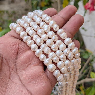 1 STRING PACK' BEAD COUNT' 30-32 PIECES' REAL FRESHWATER PEARL SIZE APPROX' 8-14 MM