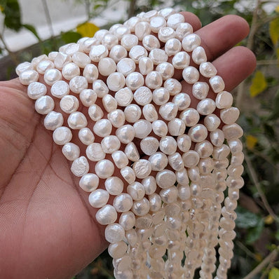 1 STRING PACK' BEAD COUNT' 49-50PIECES' REAL FRESHWATER PEARL SIZE APPROX' 8-9 MM